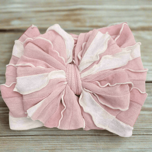 Baby hair accessory in Tickled Pink design
Ruffled baby headband with a cute pink bow
Soft pink headband for baby girls
Pink ruffled headband for newborn photoshoots
Baby girl soft headband for everyday wear
Lightweight pink baby headband for summer
Tickled Pink baby accessory with soft fabric
Fashionable pink headband for baby girls
Baby girl ruffled headband in soft pink fabric
Adorable Tickled Pink baby headband for toddlers