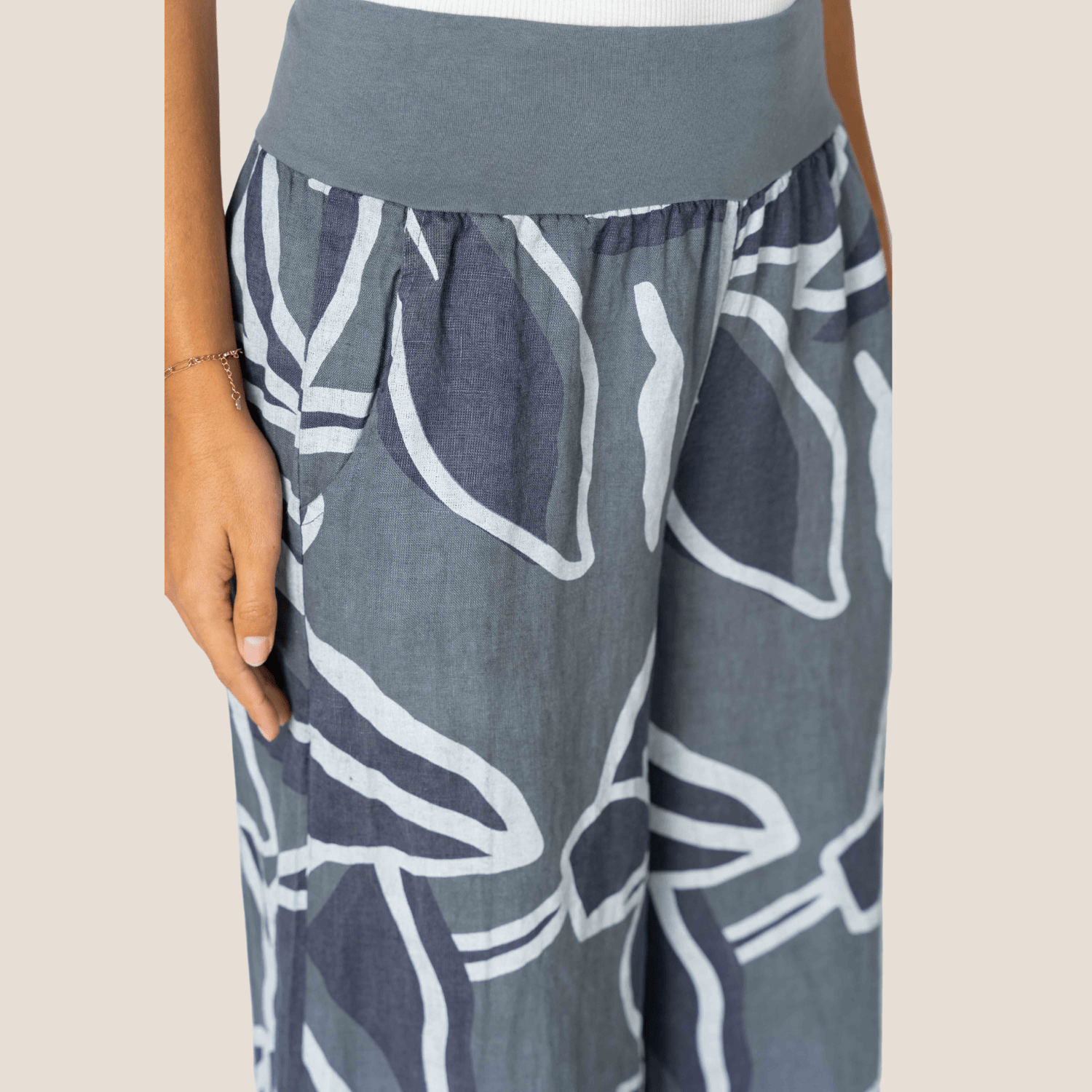 Affordable wide leg pants for women
Printed palazzo pants with pockets
Wide leg floral pants for tall women
Designer floral pants for summer events
Stylish wide-leg pants for beach vacation
How to style wide leg floral pants
Flowy floral palazzo pants for weddings
Women's floral linen pants for casual outings