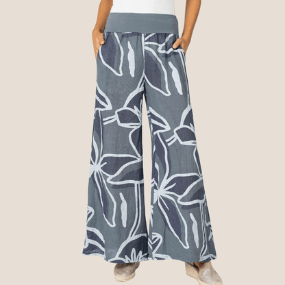 Wide leg floral pants for summer
Comfortable palazzo pants for women
Blue floral wide leg linen pants
Lightweight wide-leg pants for hot weather
Boho style wide-leg floral trousers
Relaxed fit palazzo pants for casual wear
High-waisted floral pants for women
Trendy linen wide-leg pants online